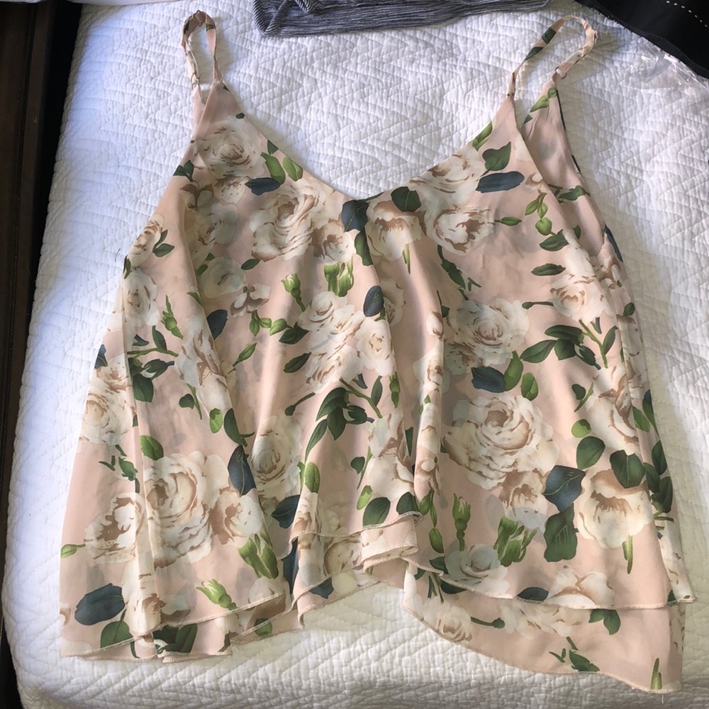Tobi flowy top with adjustable straps. Lower in back than front